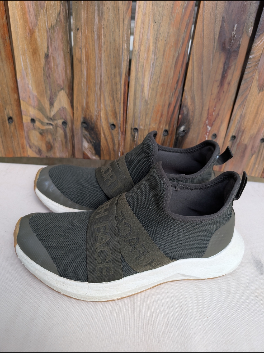 The North Face Women’s Slip-On Athletic Sneakers in Olive Green and White
